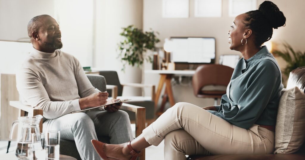 Black people, therapist or consulting with client for therapy session, discussion or counselling at